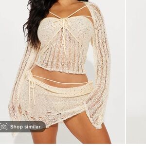 3 piece skirt set. Could also be used as a cover up. Never worn